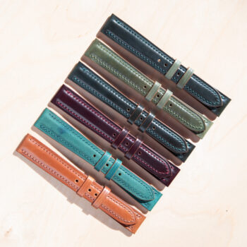 Six watch straps in a variety of colors.