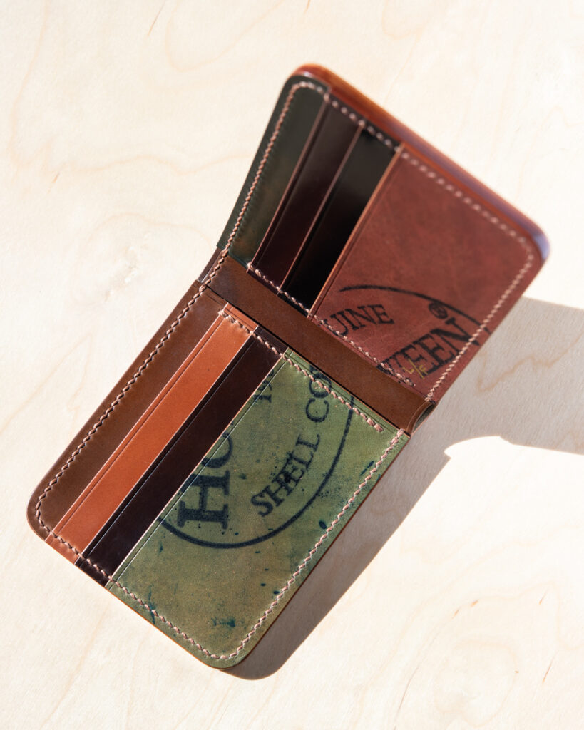 A multi-color shell cordovan bifold interior.