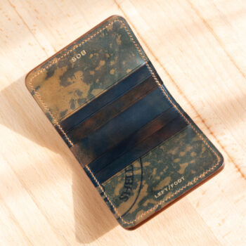 Reverse shell cordovan compact bifold.