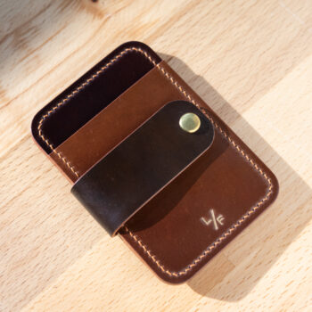 Cash strap wallet in shades of brown cordovan.