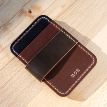 Cash strap wallet in shades of brown cordovan.