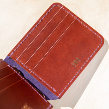 The interior of a chestnut leather wallet.