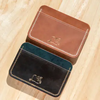 A pair of cordovan card wallets